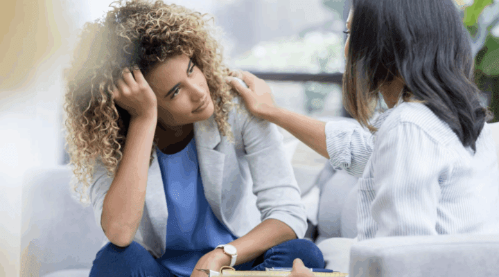 Two women talking.